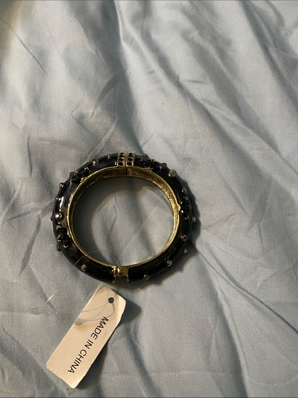 Gold-Tone Hinged Bangle Bracelet with Black Enamel and Studs